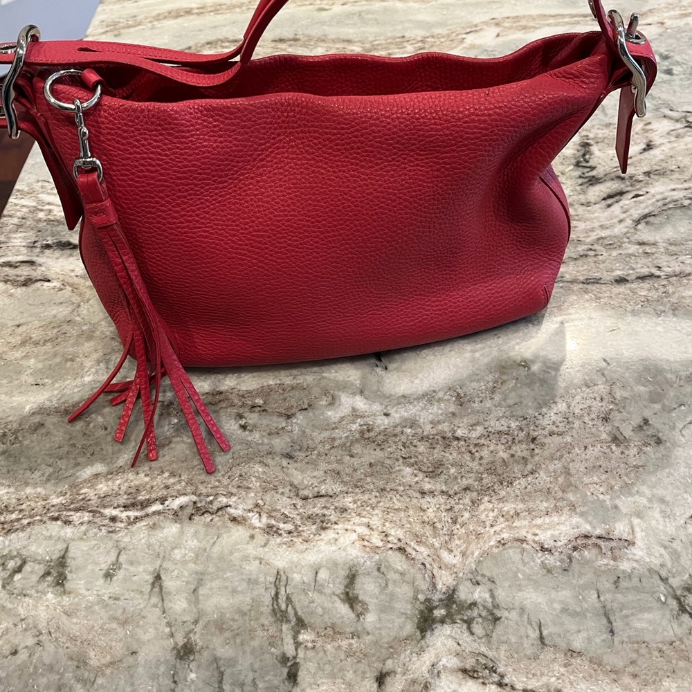 Coach Red Shoulder Bag with Pebbled Leather and Decorative Tassel
